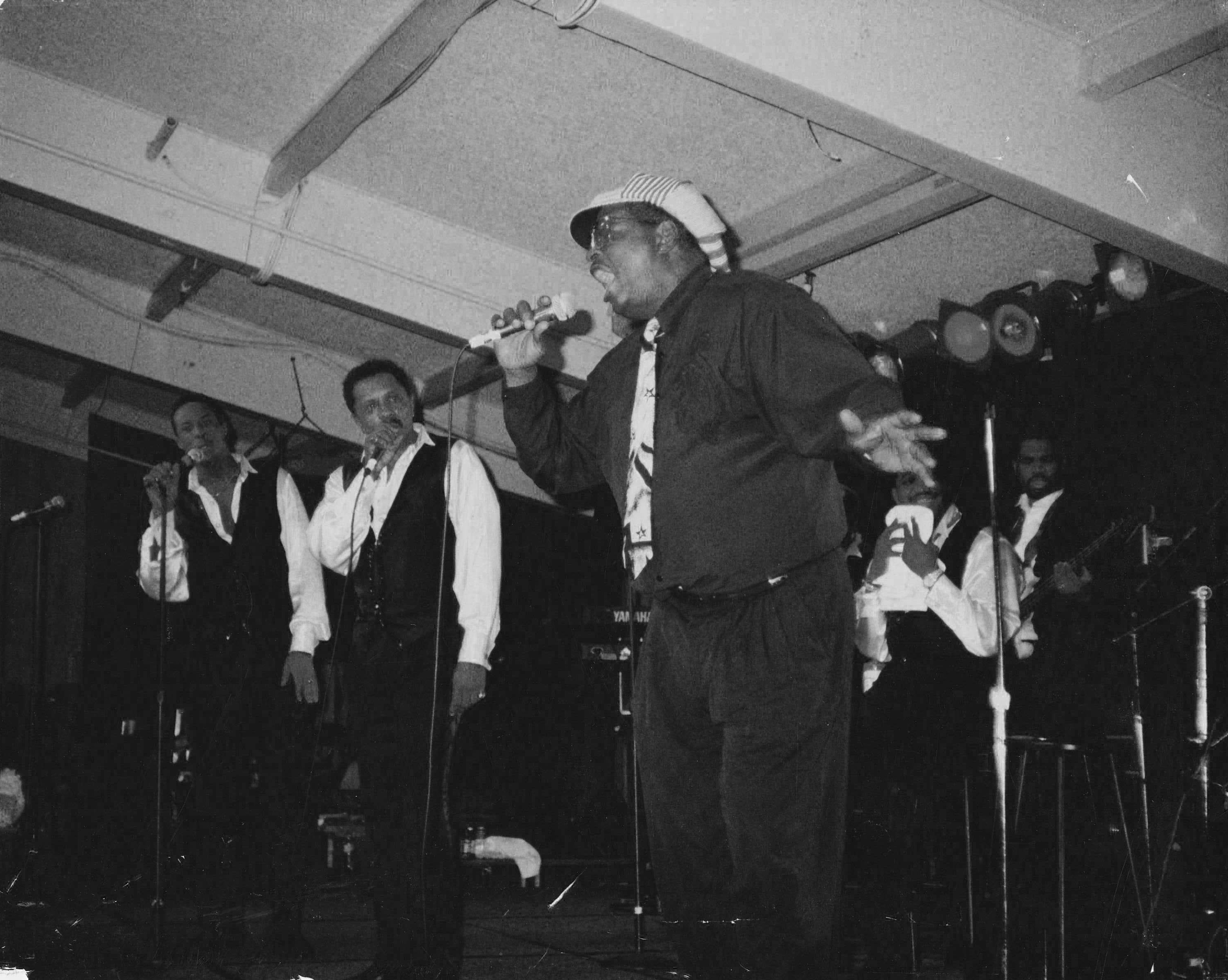 Jerry B. Bowden performing on stage with the Temptations